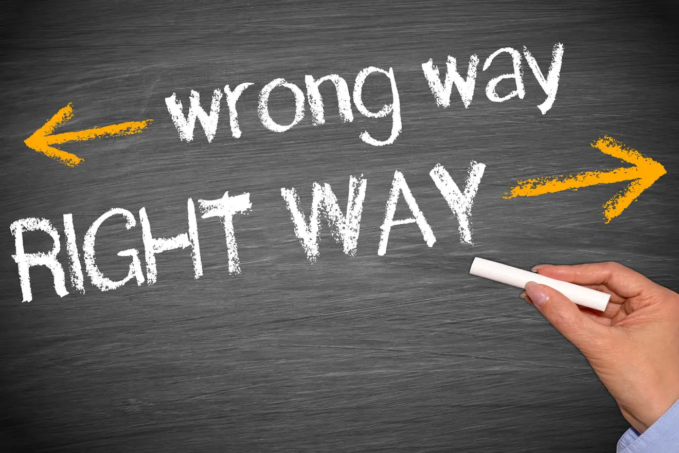 Right way and wrong way written on board
