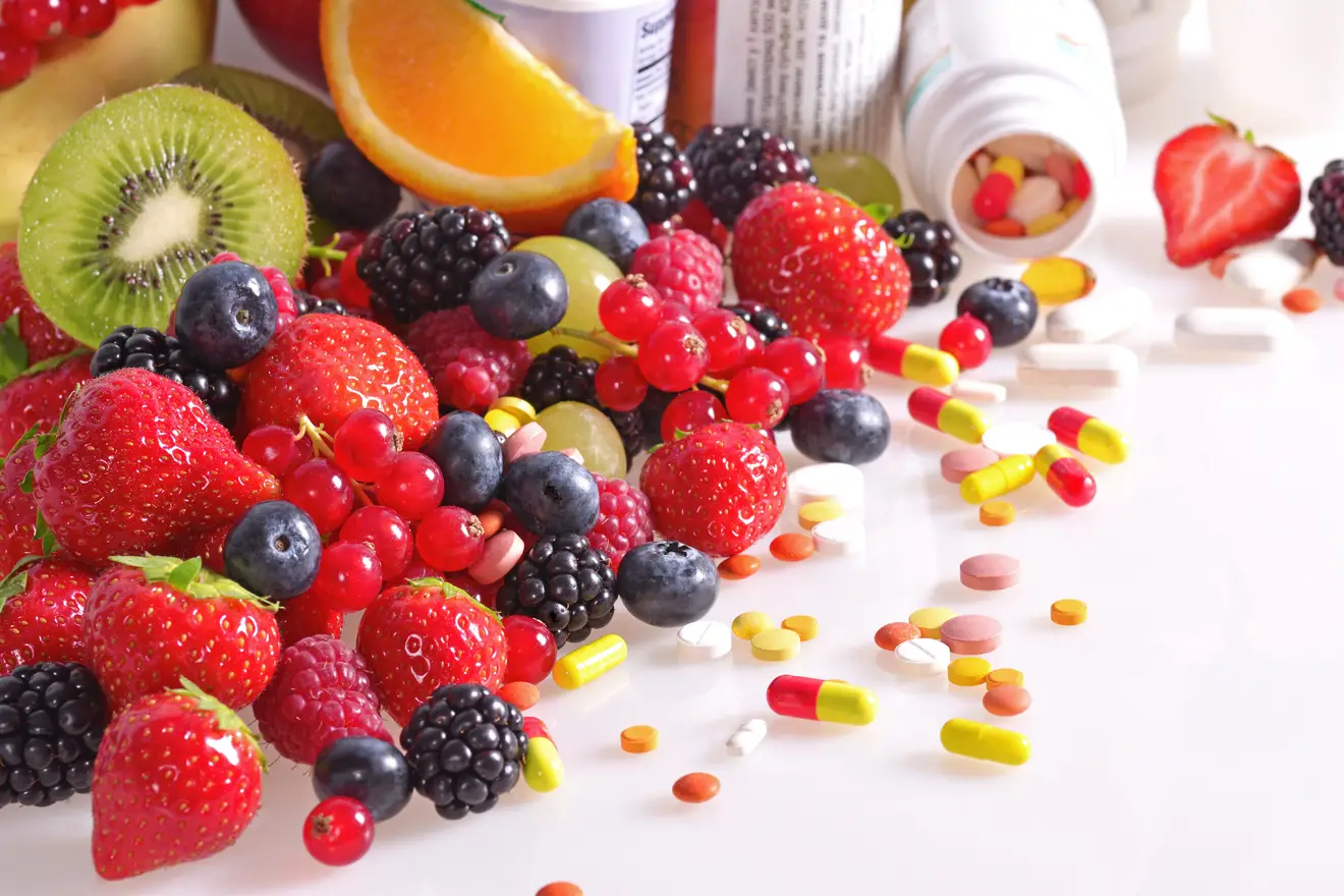 Fruits and vitamins on a table