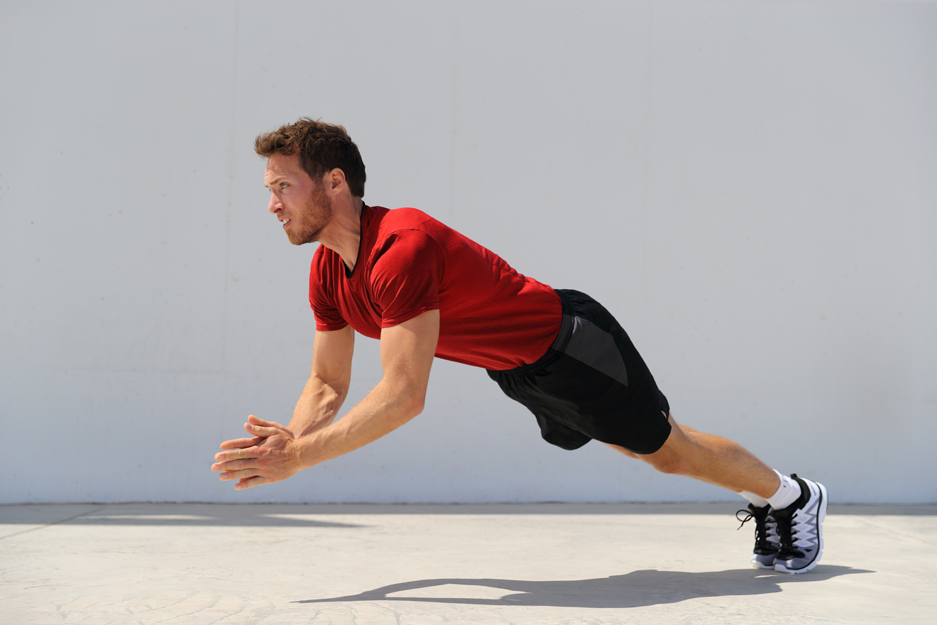Man doing clap push-ups