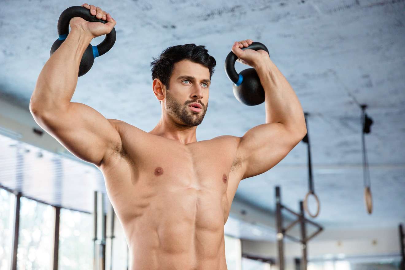 fitness man lifting kettlebell