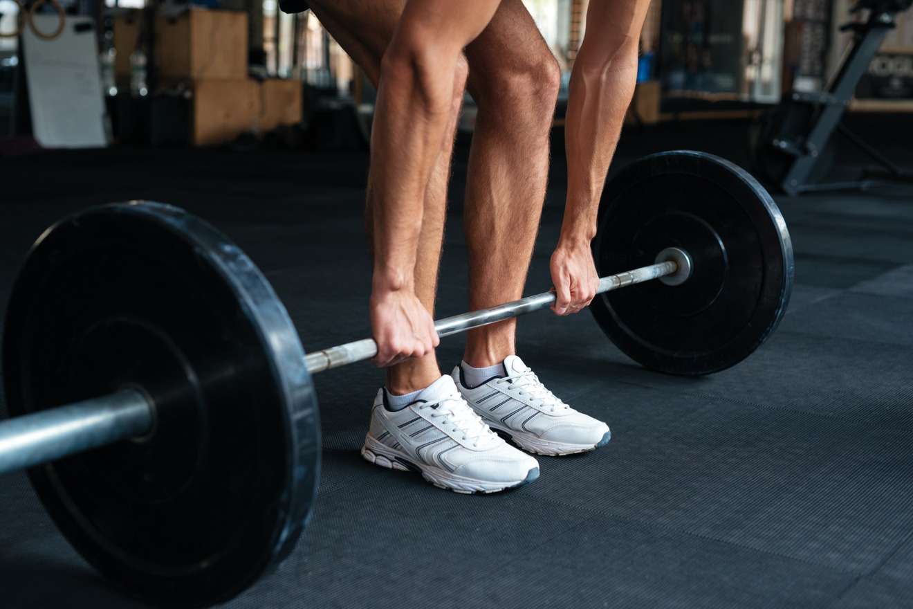 man doing Romanian deadlift exercise